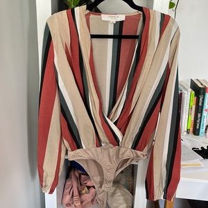 Curtain top body suit (always worn over underpants)